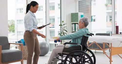 Senior Woman Exercising with Assistance in Bright Room
