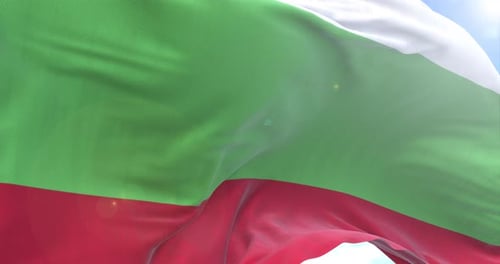 Realistic Bulgarian Flag Waving Seamless Loop Against Blue Sky