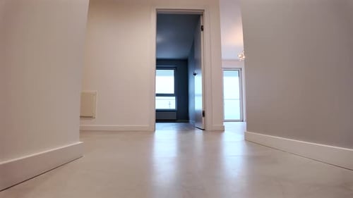 Forward Pov Walk On Narrow Corridor Towards Luxury Living Room In Modern Home.