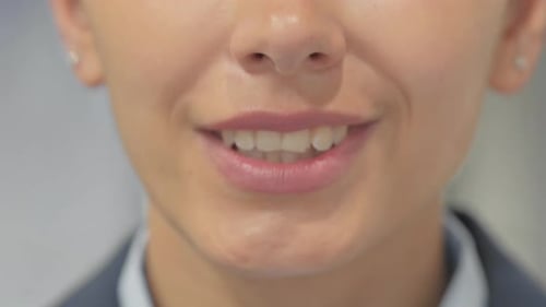Close up of Smiling Lips of Mixed Race Woman