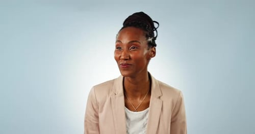 Black woman, face and secret for announcement, blue studio background and hush with finger on lips