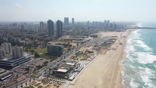 Aerial video on the coastline of Ashdod Israel on a sunny day