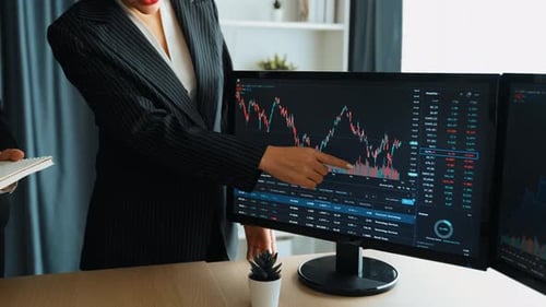 Slow motion business investor in stock trade company look at monitor. Burgeoning