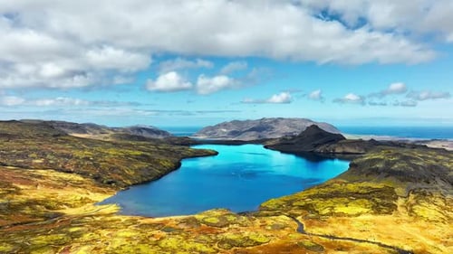 Mountain Lake Picturesque Reflection of Clouds in Clear Glacial Water Scenic Aerial Landscape in