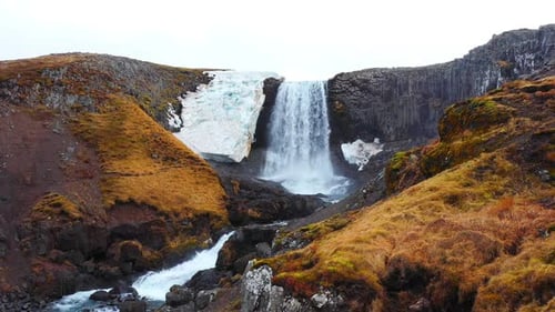 Waterfall with Pure Blue Water Nature Landscape in Autumn Iceland
