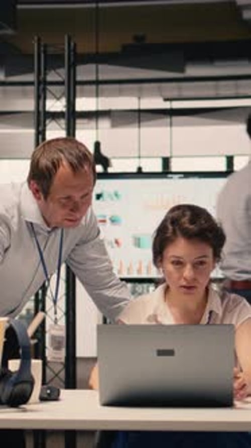 Vertical Video Corporate Teamwork Professionals Analyzing Charts KPI Metrics