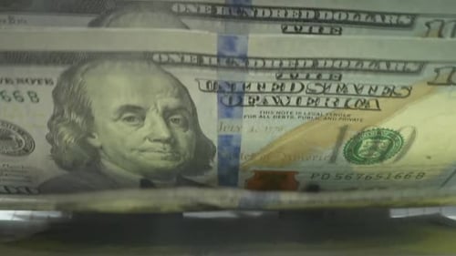 Macro Shot Counter Counting Dollar Bills Money Counting Machine with 100 Dollar Banknotes Bank