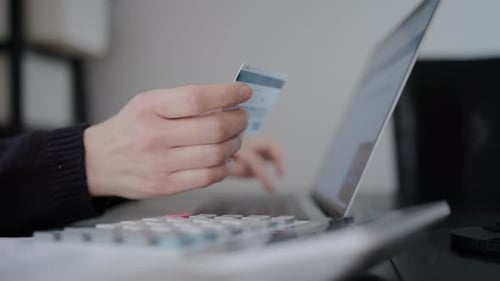 Close Up Shot of Female Hands Entering Credit Card Data Makes Purchase Paying Bills Use Ebank