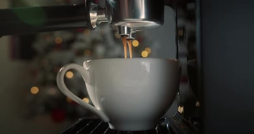 Close Up of Coffee Pouring Into Mug