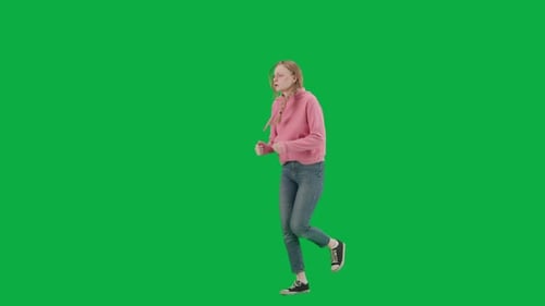 Portrait of Victim on Chroma Key Green Screen Background Young Girl Running Scared Expression