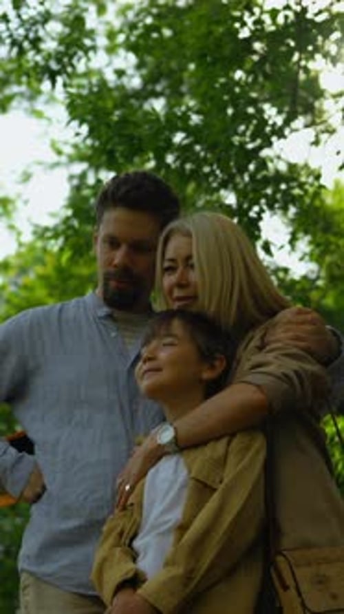 Happy Family Walking Together in Summer Park Clip