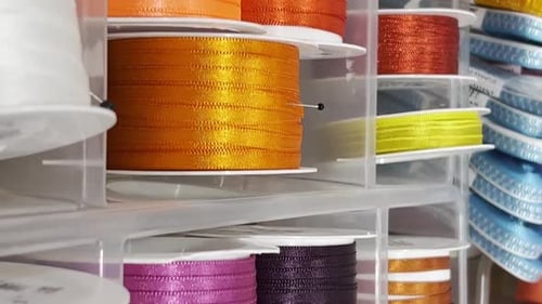 Gift Ribbons of Different Colors in a Textile Store Slow Motion Vertical Video