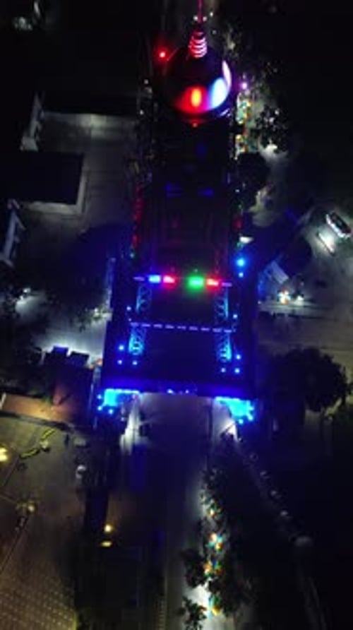 Vertical drone footage of Limboto Majesty Tower or Pakaya Tower at night