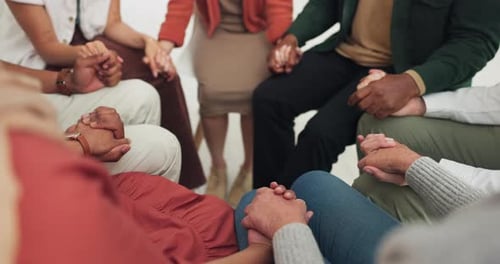 Group of people, holding hands and prayer in support, faith and healing for religion