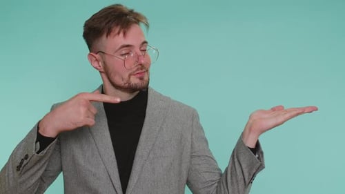 Businessman Pointing Empty Place Advertising Area for Commercial Text Copy Space for Goods Promotion