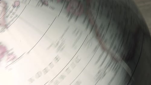 Globe getting turned in bright room_3