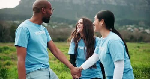 Happy Volunteers Celebrate Success in Rural Field