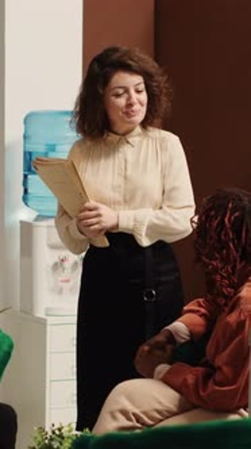 Vertical Video Hotel Manager Taking Tourists Feedback