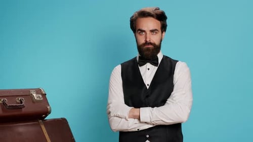 Hotel Porter Wears Gloves for Assistance