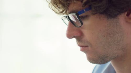 Hands Typing on Laptop Keyboard at Work