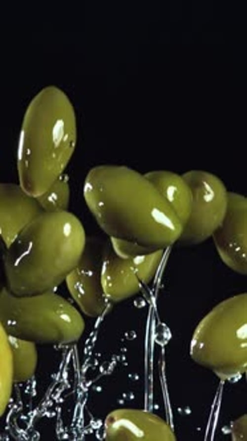 The Olives Fly Up and Fall Down Filmed on a Highspeed Camera at 1000 Fps