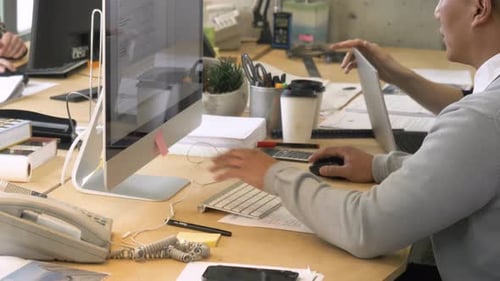 Business People Talking Meeting at Computer in Office 4549 Years