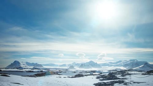 Winter Mountain Landscape with Bright Sun Glow Effect