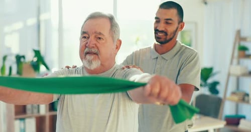 Senior Doing Rehabilitation With Exercise Band