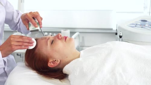 Young Adult Receiving a Facial Treatment