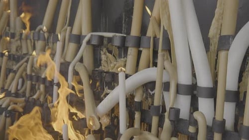 Votive candles burn in the chapel of apparitions in the sanctuary of Fatima
