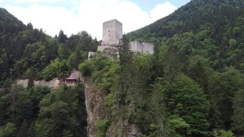 Zil Kale Castle, Rize, Turkiye. A drone rises and slowly introduces us to this historical cliffside
