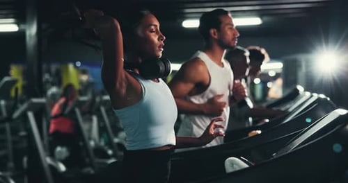 Break, fitness and music with woman on treadmill in gym for cardio training, health or wellness