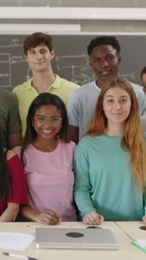 Group of Students Smiling in a Classroom