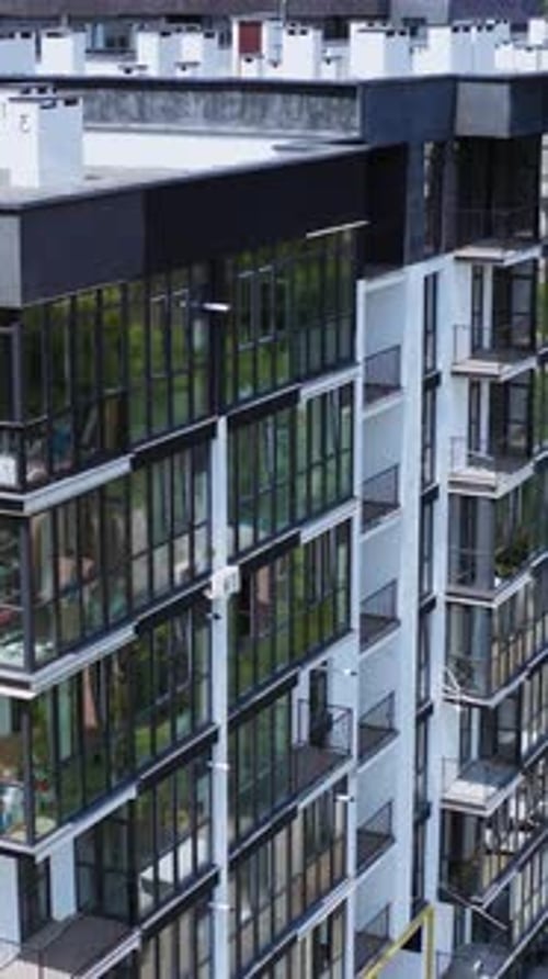 Drone view of standard apartment. Aerial view of the city with multi storey residential buildings.