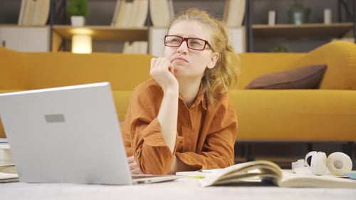 Thoughtful college student girl.