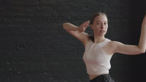 Young Adult Dancing in a Studio