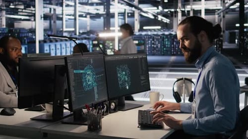 Data Center Team Working on Computers