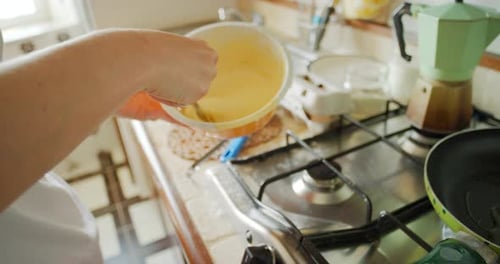 Pancake Batter Poured Into Hot Frying Pan