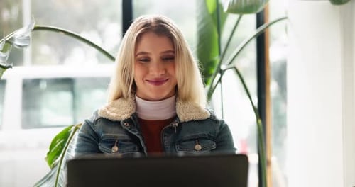 Laptop, reading and woman in coffee shop for remote work on creative project with editing