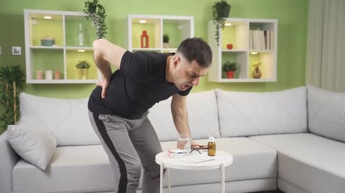 A man with a herniated disc, lifting heavy objects.