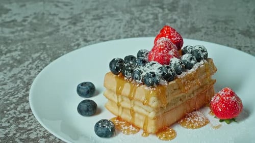 Waffles with Berries and Powdered Sugar