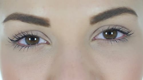 Blinking Eyes of Beautiful Woman Close Up