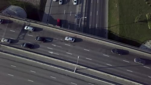 This is an Aerial View Showcasing the Urban Traffic As It Flows Along an Open Highway Stock Clip