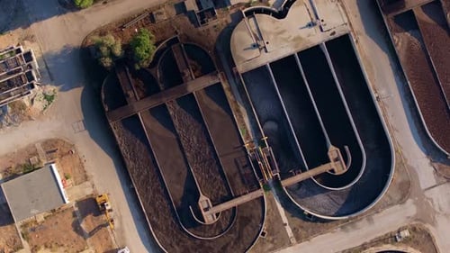 Aerial view of modern water facility with geometric patterns, Greece.