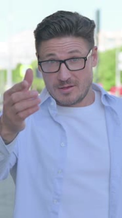 Man Inviting and Smiling in Urban Portrait