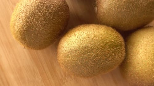 Close Up of Kiwis on Cutting Board