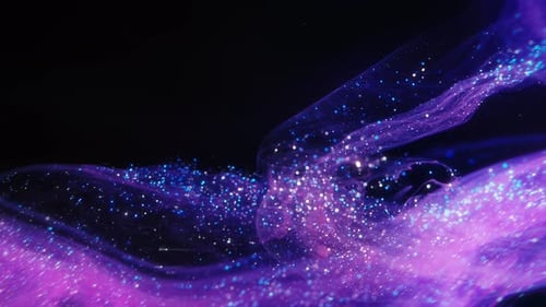 Real Ink Swirl with Sparkling Particles on Black Background