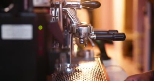 Machine, hands or barista making coffee in restaurant, process and professional service in small
