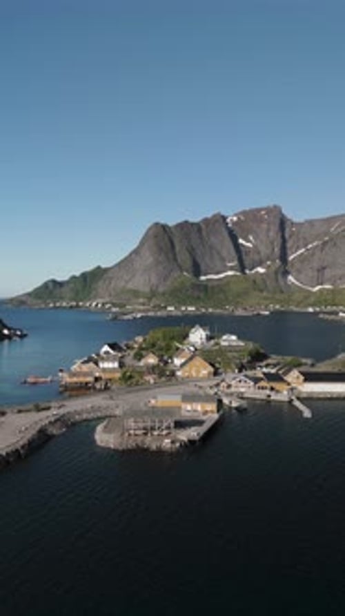 Stunning Coastal Village in Norway Surrounded By Majestic Mountains and Crystalclear Waters