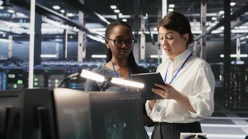 Teamworking Engineers in Data Center Integrating AI Automation Tools